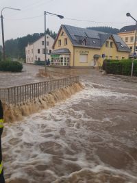 OBRAZEM: Z potůčků běsnící řeky! Takto bleskové záplavy postihly sever Čech!